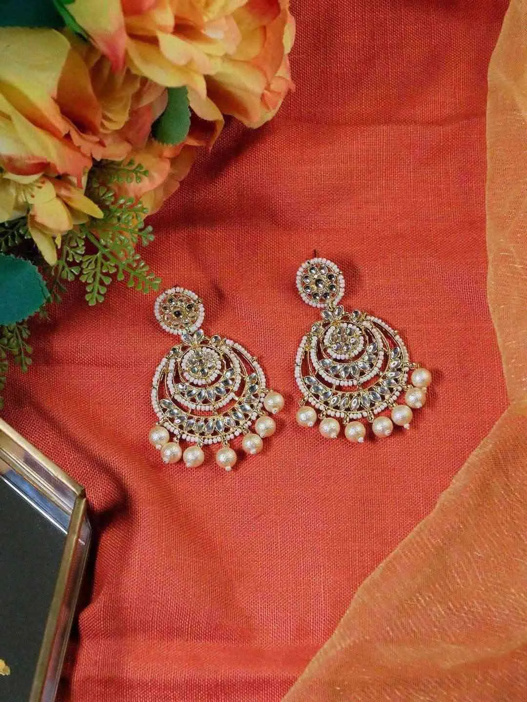 Megha Mathew In Kundan Chandbali Earrings With Pearls
